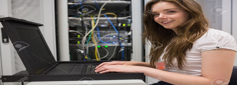 15593241 Smiling woman searching through servers in data center Stock Photo - 960A